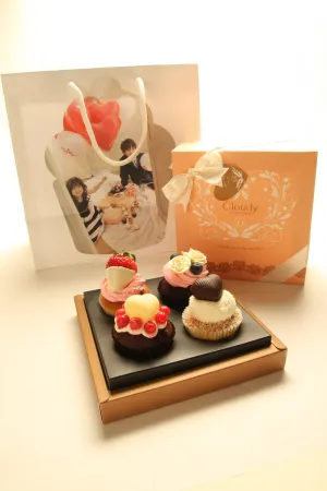 克勞蒂杯子蛋糕用Owen和Ella的照片做成袋子，好可愛